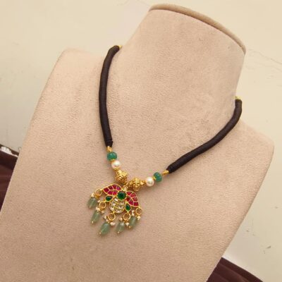Traditional Dori Necklace with Jadau Pendant, Pearls, and Green Beads