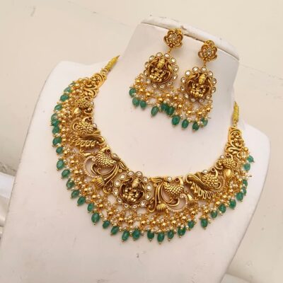Antique Matte Gold Temple Necklace Set with Peacock and Lakshmi Motifs