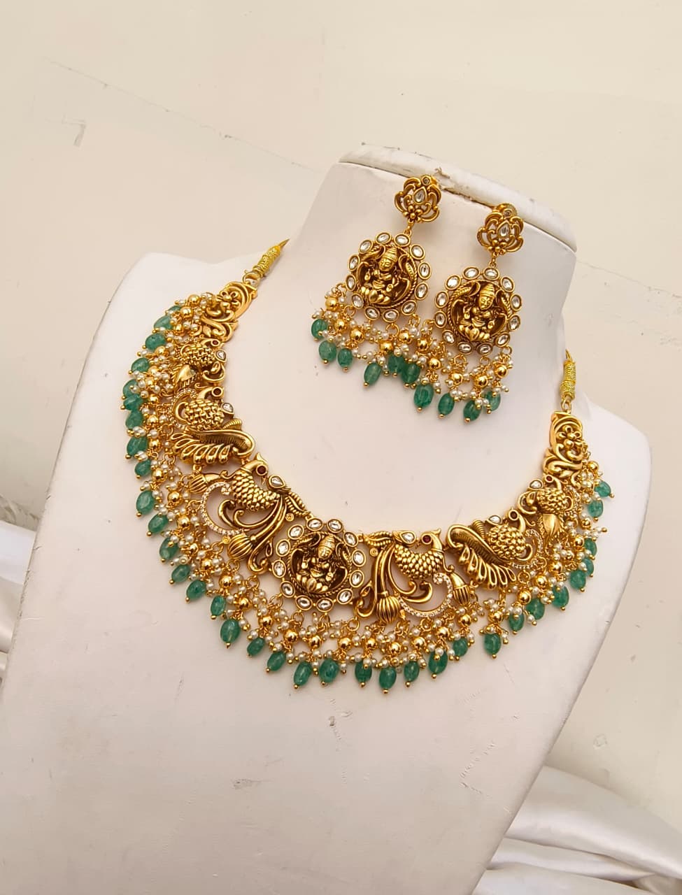 Antique Matte Gold Temple Necklace Set with Peacock and Lakshmi Motifs