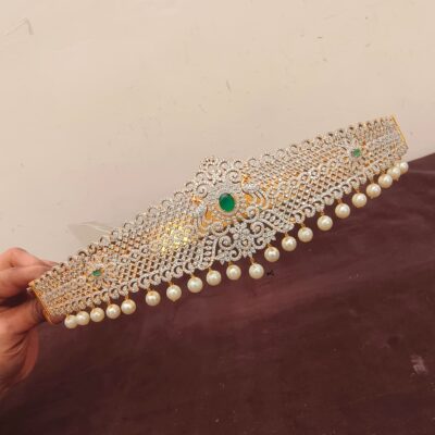 Grand CZ Floral & Peacock Vaddanam with Emerald Accents & Pearl Drops
